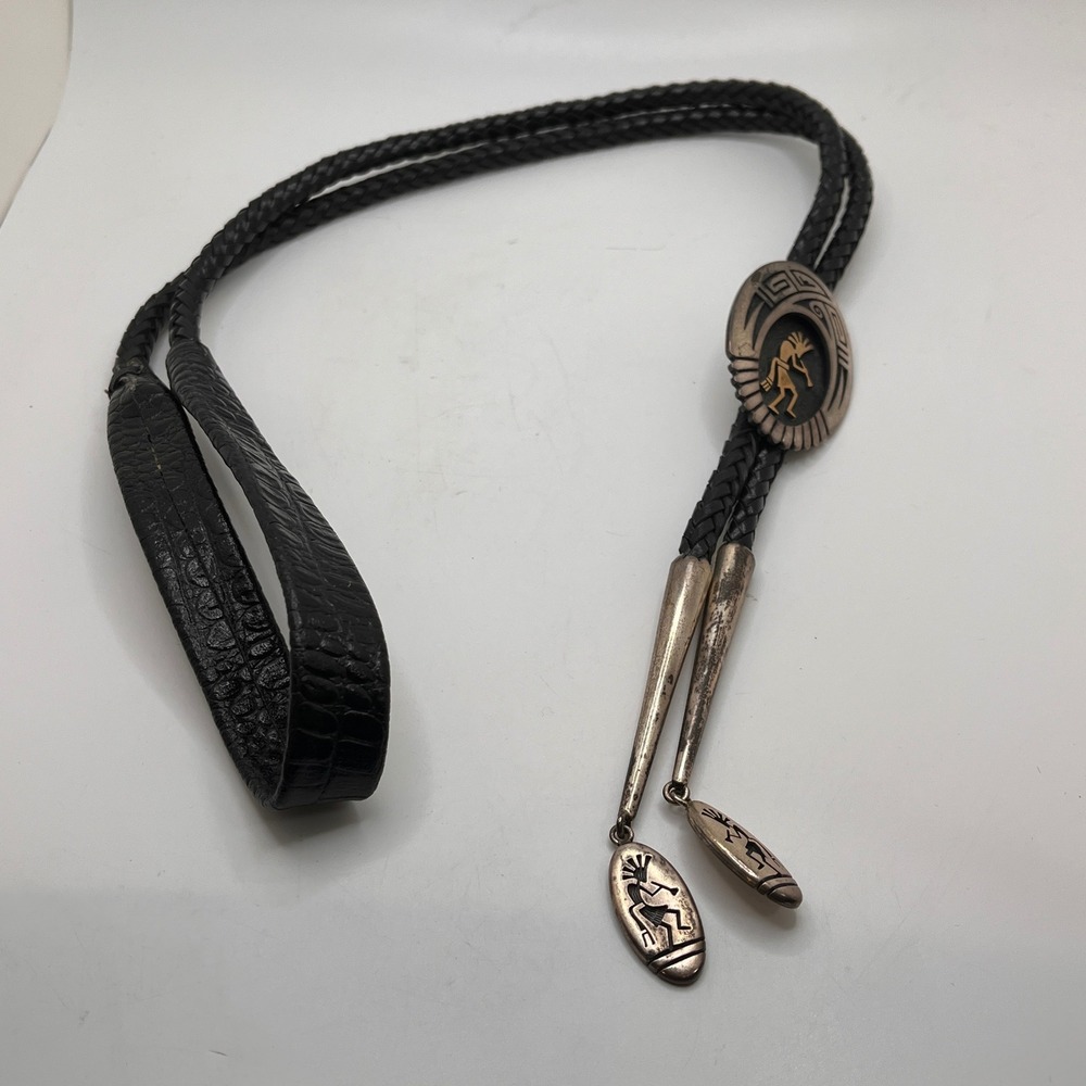 VTG Hopi Dalangyawma Sterling Silver Kokopelli Bolo Tie Black Braided Leather
